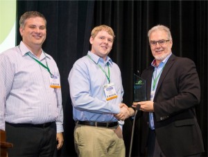 Adam Renner and James West accept their 3rd Prize trophy from IPSO Vice President Christian Légaré (Micrium)